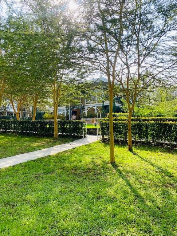 Lake Elementaita Manor lush gardens and lake view